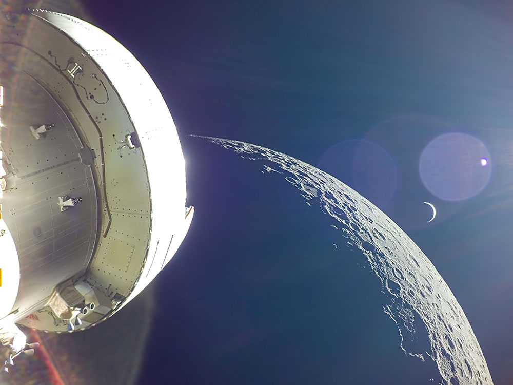 Artemis I showing moon and earth