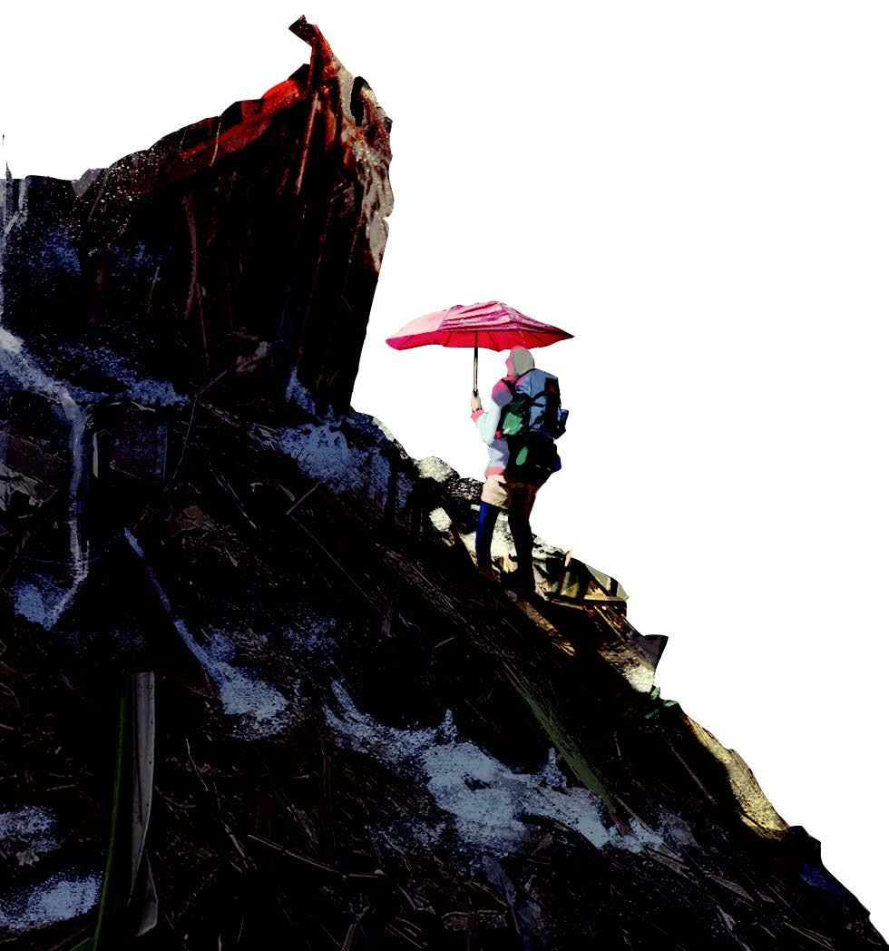 Figure with Red Umbrella on bile of refuse in Born from Memory